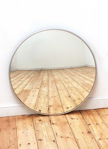 A convex wall mirror,