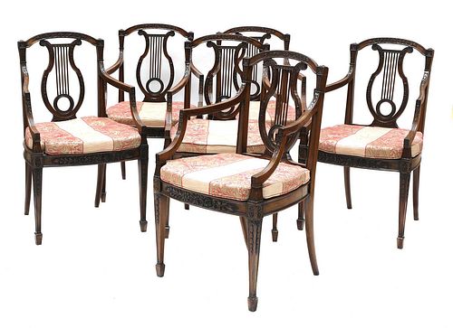 A set of six mahogany Sheraton Revival dining armchairs,