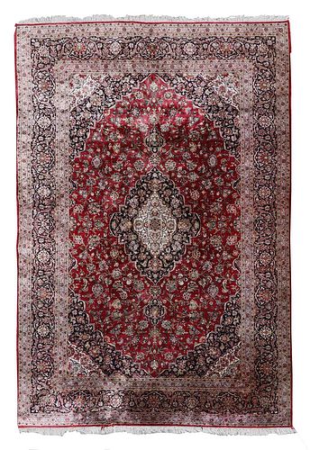 A Persian wool and silk Kashan carpet,