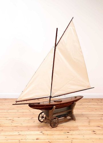 A large rigged pond yacht,