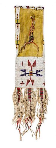 A Sioux Beaded Tobacco Bag Length 19 inches to bottom of bag, 30 inches overall.