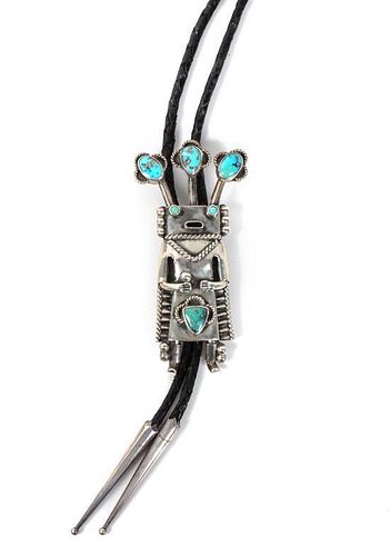 A Silver and Turquoise Kachina Figure Bolo Height 3 1/2 inches.