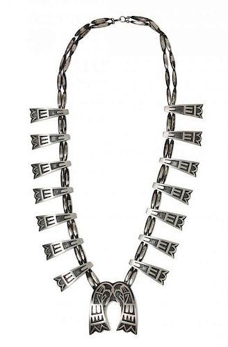 A Hopi Overlay Necklace Length 28 inches; naja height 2 1/4 x width 2 1/8 inches.