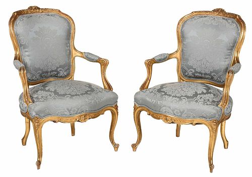 Pair Louis XV Style Carved Gilt Armchairs