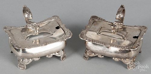 Pair of English silver mustard pots, ca. 1924, bearing the touch of H.E. & Co. Ltd., 2'' h., 3 5/8'' w.