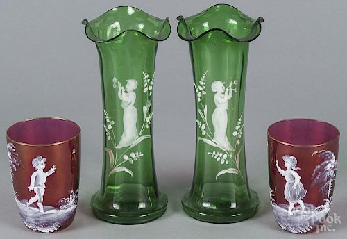 Pair of Mary Gregory enameled emerald glass vases, 8'' h., together with a pair of ruby cups, 4'' h.
