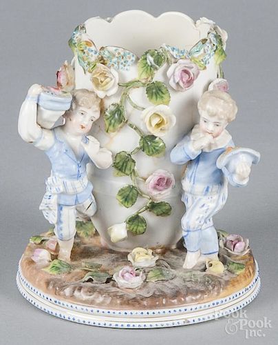 Pair of German figural porcelain spill vases, 19th c., 5 1/4'' h.