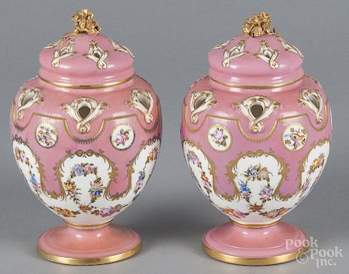 Pair of porcelain potpourri vases and covers, 19th c., probably Coalport, 7 3/4'' h.