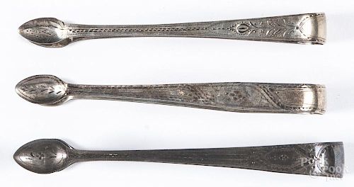 Three English bright cut silver sugar tongs, 1794-1795, 1796-1797, and 1808-1809