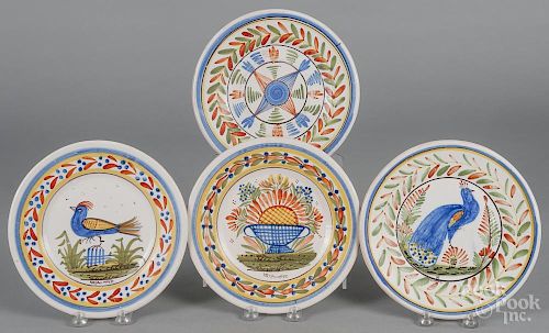 Four early Quimper plates, 9 1/4'' dia.