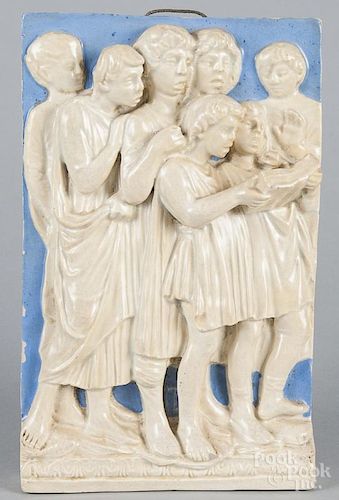 Italian relief pottery plaque of boys singing, 12 1/2'' x 7 3/4''.
