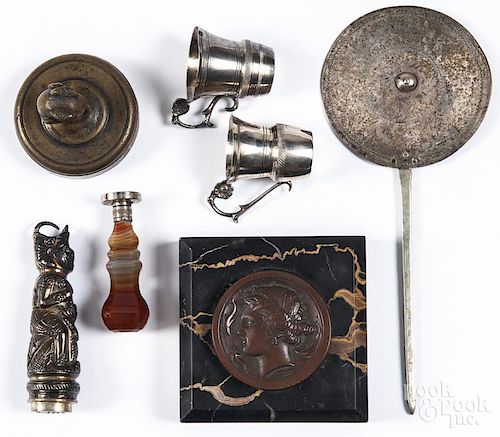 Assorted desk implements, to include a seal with a stone handle, a silver-handled seal, a bronze
