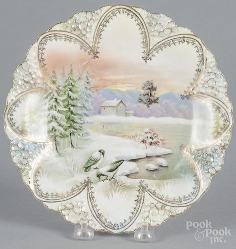 R. S. Prussia porcelain snow bird, ca. 1900, with a cabin plate, 8 1/2'' dia.