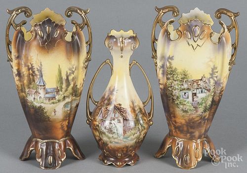 Three R. S. Prussia porcelain vases, ca. 1900, to include cottage, mill, and church scenes