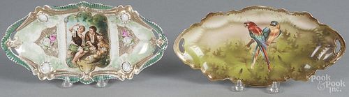 Two R. S. Prussia porcelain trays, ca. 1900, one with melon boys, the other with parrots, 9 3/4'' w.