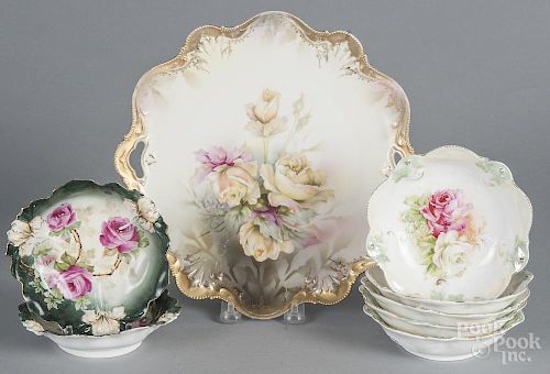 Set of five R. S. Prussia porcelain floral berry dishes, ca. 1900, 5 1/4'' dia.