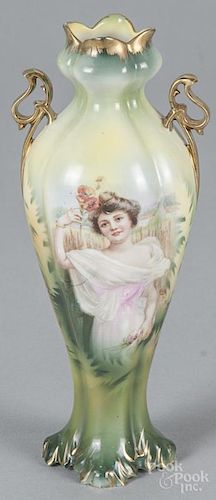 R. S. Prussia porcelain swan creamer, ca. 1900, 4 1/2'' h., together with a portrait vase, 7 3/4'' h.