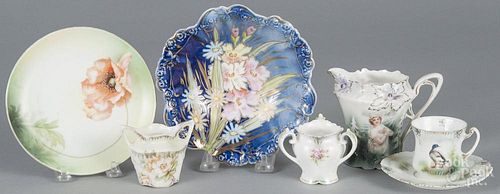 Three pieces of R. S. Prussia porcelain, ca. 1900, to include a duck cup and saucer
