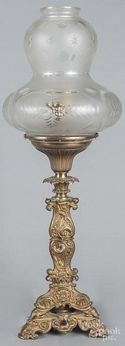 Brass table lamp, early 20th c., with a frosted cut to clear shade, 28 1/2'' h.