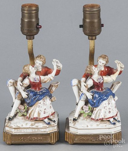Two pairs of figural porcelain groups, mounted as lamps, ca. 1900, 6 1/2'' h. and 7 1/2'' h.