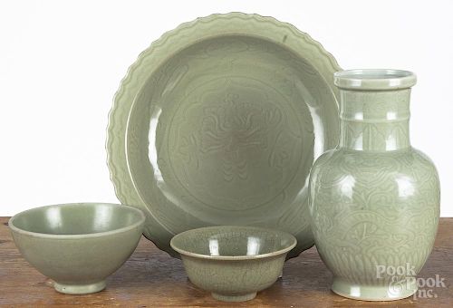 Four Chinese celadon glazewares, to include a vase, 10 3/4'' h., and three bowls.