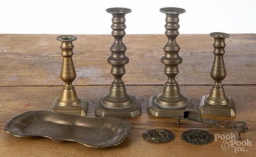 Two pairs of brass candlesticks, late 19th c., together with a snuffer, an undertray
