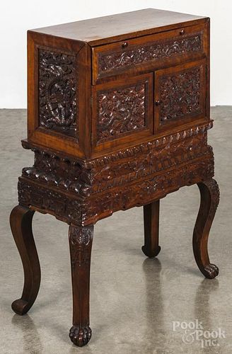 Small Chinese carved hardwood cabinet, 20th c., 27 1/4'' h., 18 1/2'' w.