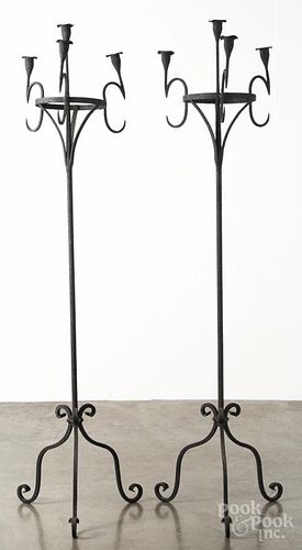 Pair of wrought iron torchiers, 20th c., 66'' h.
