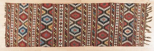 Kilim carpet, early 20th c., 10'2'' x 3'3''.