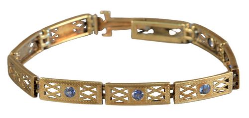 14 Karat Gold Wordley Allsopp and Bliss Art Deco Bracelet, having small blue stones, possibly Montana sapphires, length 6 1/4 inches.
