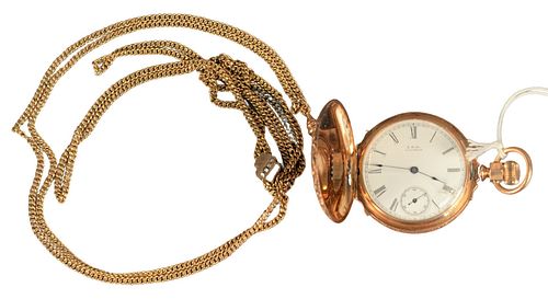 14 Karat Gold American Waltham Closed Face Pocket Watch, along with slide chain, 15.7millimeter, 58.4 grams total weight, (crack in glass).