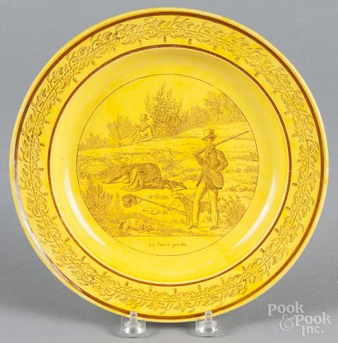 French canary plate, 19th c., with a transfer hunting scene, titled Le Furet Perdu, 9 3/8'' dia.