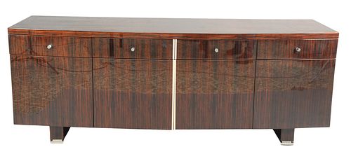 Dakota Jackson Lacquered Macassar Ebony Credenza, having four drawers over four doors, height 32 1/2 inches, length 84 1/4 inches, depth 25 inches.