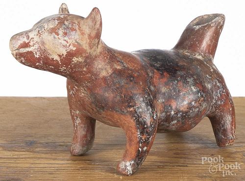 Colima pre-Columbian pottery dog vessel with a red glaze, black speckling, and a tail-formed spout