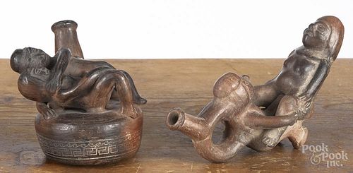 Two Mochica pre-Columbian style erotic form stirrup vessels, largest - 6 1/4'' h., 7 1/2'' w.