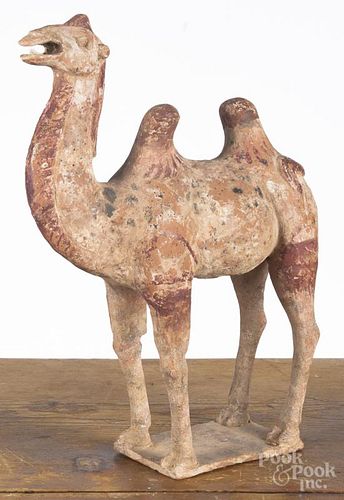 Chinese painted terra cotta Bactrian camel, likely Tang dynasty, retaining traces of old red