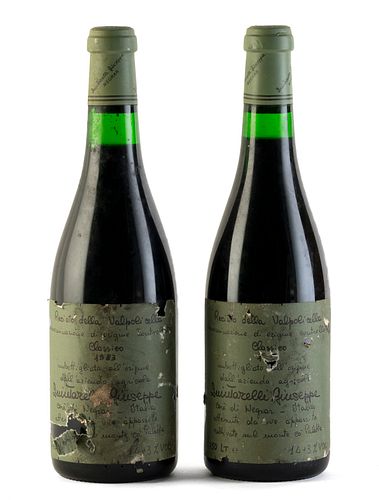 Two Giuseppe Quintarelli-Recioto della Valpolicella Classico bottles, vintage 1983.
Category: red wine. Valpolicella D.O.C.. Negrar, Veneto (Italy).