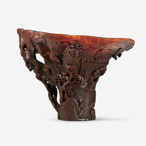 A Chinese Carved Rhinoceros Horn Libation Cup 17th/18th century