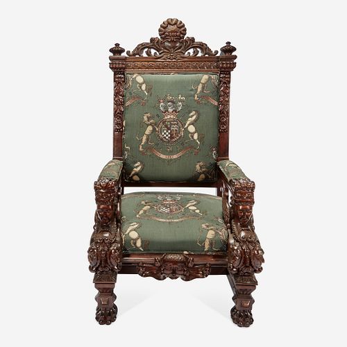 A Large Carved Renaissance Revival Throne Chair Upholstered in Armorial Fabric