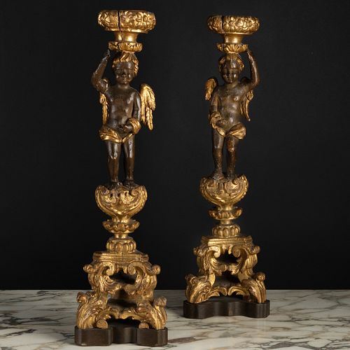 Pair of Italian Baroque Painted and Parcel-Gilt Cherub-Form Altar Candlesticks 