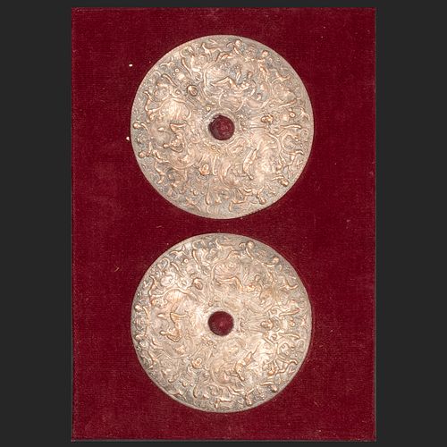 Two Renaissance Style Embossed Copper Small Circular Plaques Mounted on a Velvet Panel