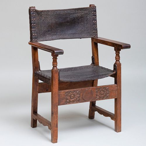 Iberian Carved Walnut and Embossed Leather Armchair
