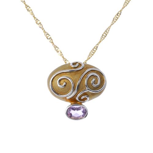 CLOGAU - a 9ct gold amethyst pendant. Of bi-colour design, the oval-shape amethyst, below a textured