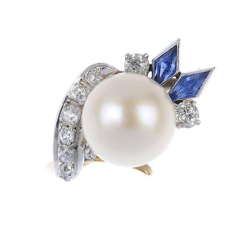 A cultured pearl, diamond and synthetic sapphire dress ring. The cultured pearl measuring 9.3mms, wi