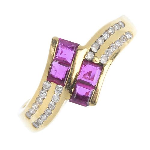 A ruby and diamond crossover ring. The two pairs of square-shape rubies, to the brilliant-cut diamon