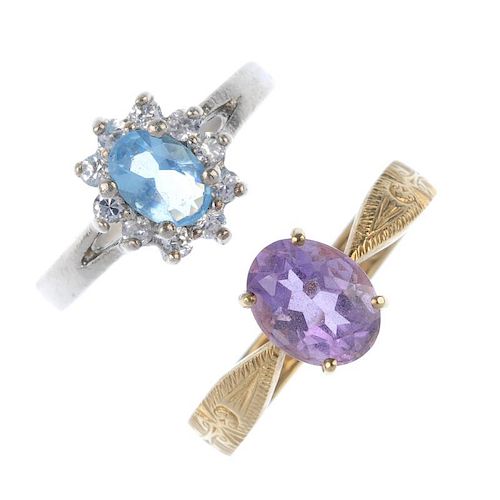 A selection of gem-set rings. To include a cushion-shape amethyst ring with bifurcated shoulders, an