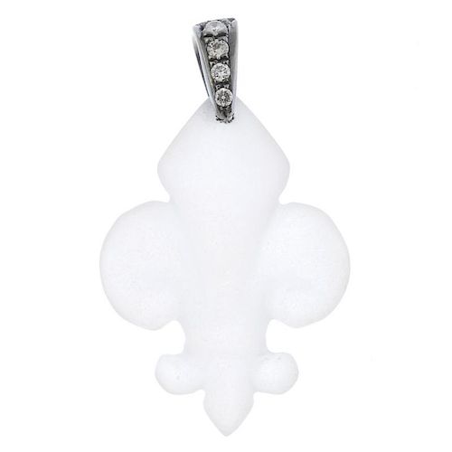 A rock crystal and diamond pendant. The frosted rock crystal fleur-de-lys, with graduated brilliant-