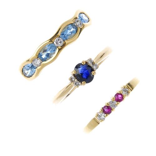 A selection of four 18ct gold diamond and gem-set rings. To include an emerald and diamond three-sto