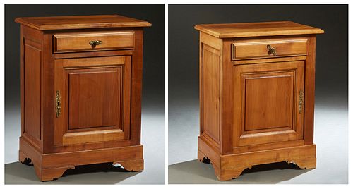 Pair of French Carved Cherry Louis Philippe Style Nightstands, the ogee edge rectangular top over a frieze drawer and a fielded panel cupboard door, o