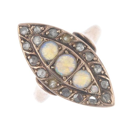 A late Victorian 9ct gold opal and diamond dress ring. Of marquise-shape outline, the graduated circ